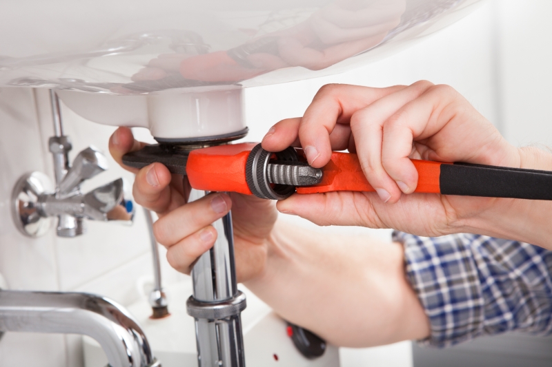 Emergency plumber attending a job in Brixton